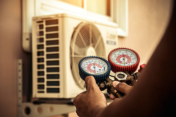 Professional Hvac Maintenance technician working in Winter Beach, FL